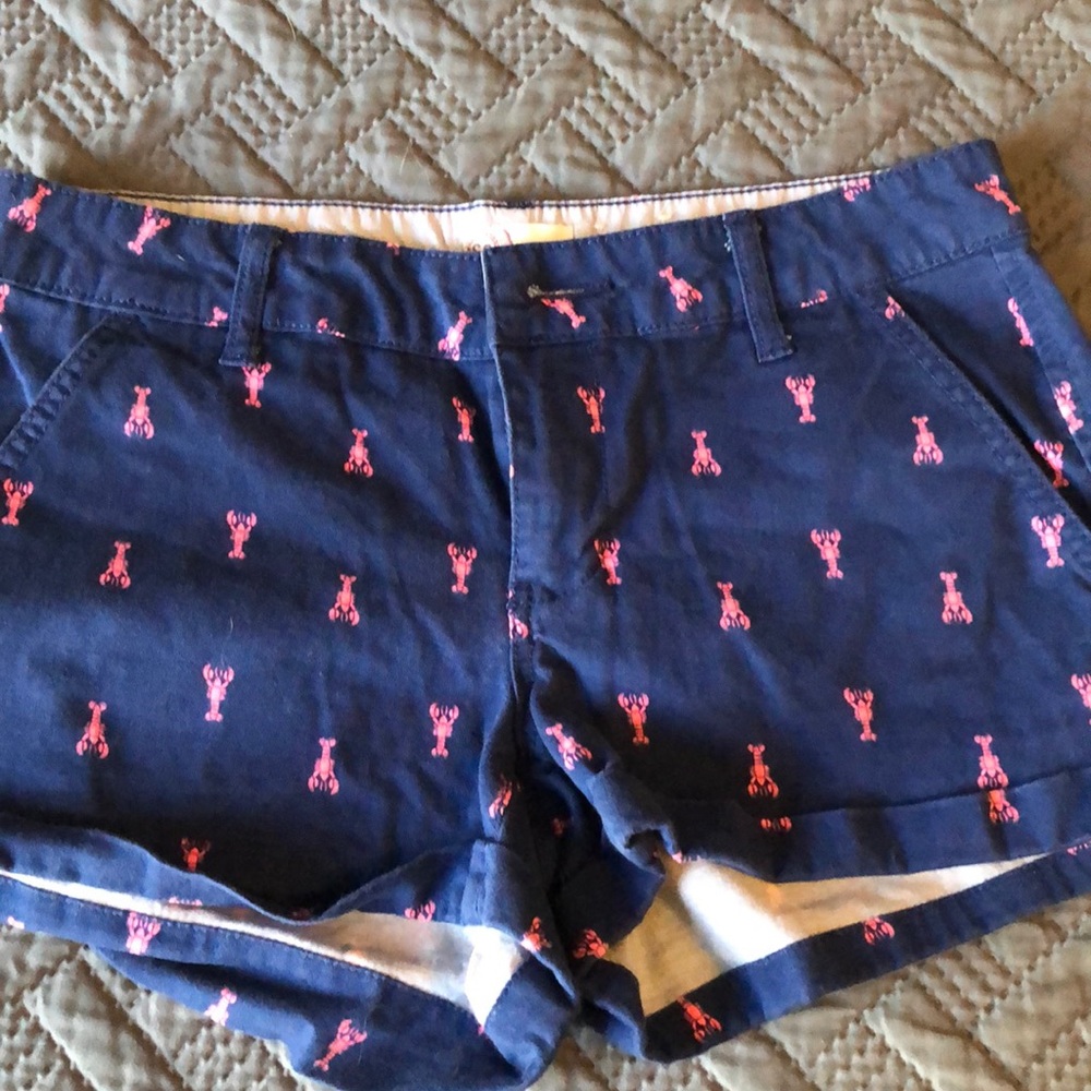Navy blue shorts with pink lobsters